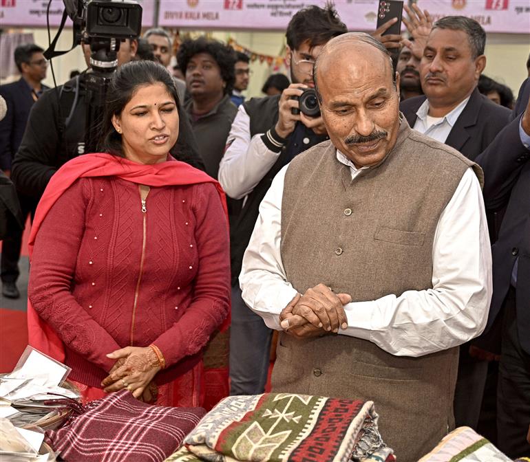 The Union Minister of Social Justice and Empowerment, Dr. Virendra Kumar visits an exhibition during the inauguration the 22nd Divya Kala Mela, in New Delhi on December 12, 2024.