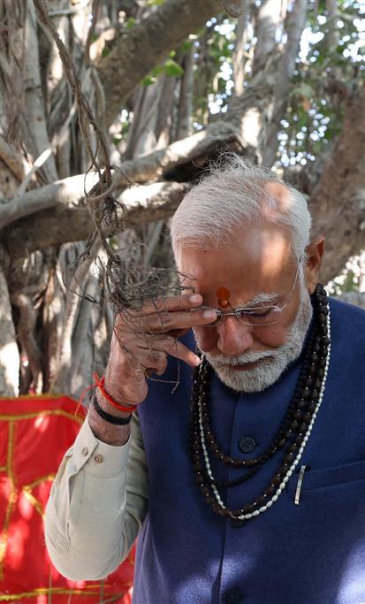 PM performs pooja at Akshay Vata Vriksh, in Prayagraj, Uttar Pradesh on December 13, 2024.