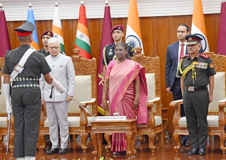 The President of India, Smt. Droupadi Murmu presents the Colours to the College of Defence Management during the Presidential Colours Investiture Ceremony at Secunderabad, in Hyderabad on December 20, 2024.