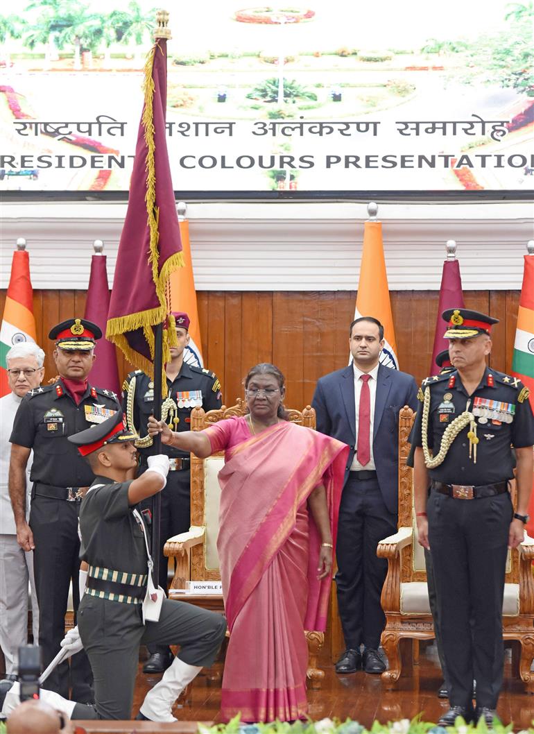 The President of India, Smt. Droupadi Murmu presents the Colours to the College of Defence Management during the Presidential Colours Investiture Ceremony at Secunderabad, in Hyderabad on December 20, 2024.