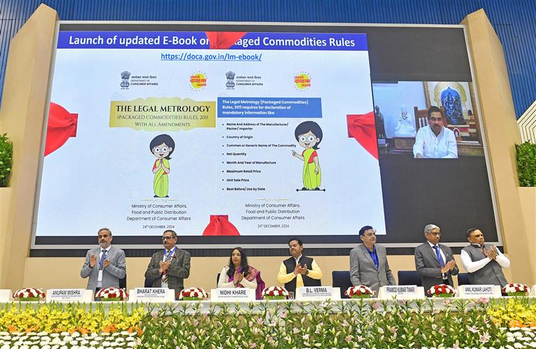 The Union Minister for Consumer Affairs, Food and Public Distribution, Shri Pralhad Joshi launches the various initiatives via video conferencing at National Consumer Day Celebrations, in New Delhi on December 24, 2024. The Minister of State for Consumer Affairs, Food and Public Distribution and Social Justice and Empowerment, Shri B. L. Verma is also seen.