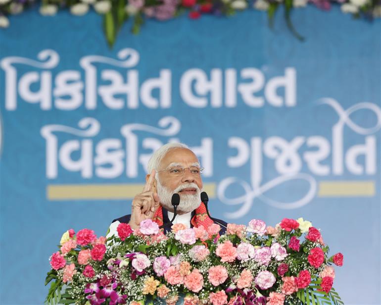PM addressing at foundation stone laying and inauguration of multiple development projects at Dwarka, in Gujarat on February 25, 2024.