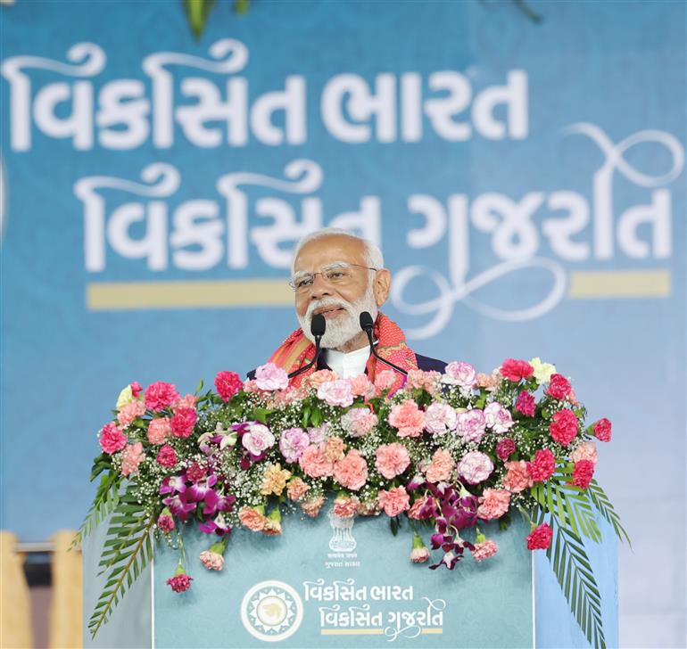 PM addressing at foundation stone laying and inauguration of multiple development projects at Dwarka, in Gujarat on February 25, 2024.