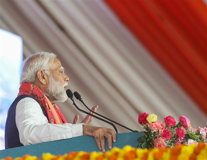 PM addressing at foundation stone laying and inauguration of multiple development projects at Dwarka, in Gujarat on February 25, 2024.
