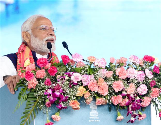 PM addressing at foundation stone laying and inauguration of multiple development projects at Dwarka, in Gujarat on February 25, 2024.