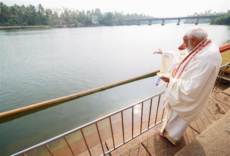 PM feeds fishes at Thriprayar Shree Ramaswami Temple in Thrissur, Kerala on January 17, 2024.