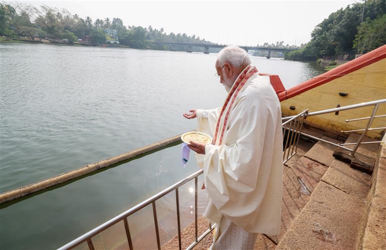 PM feeds fishes at Thriprayar Shree Ramaswami Temple in Thrissur, Kerala on January 17, 2024.