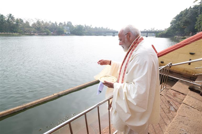 PM feeds fishes at Thriprayar Shree Ramaswami Temple in Thrissur, Kerala on January 17, 2024.