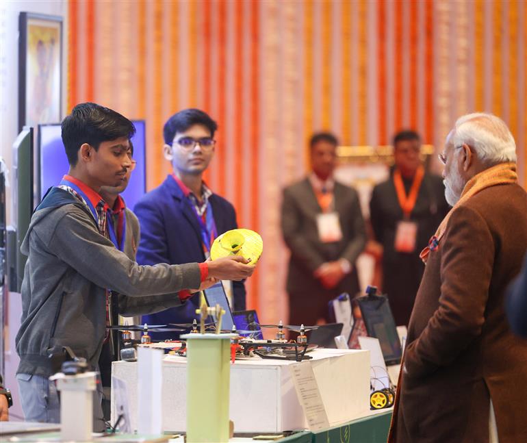 PM visits an exhibition ahead of 7th edition of Pariksha Pe Charcha (PPC) at Bharat Mandapam, in New Delhi on January 29, 2024. 