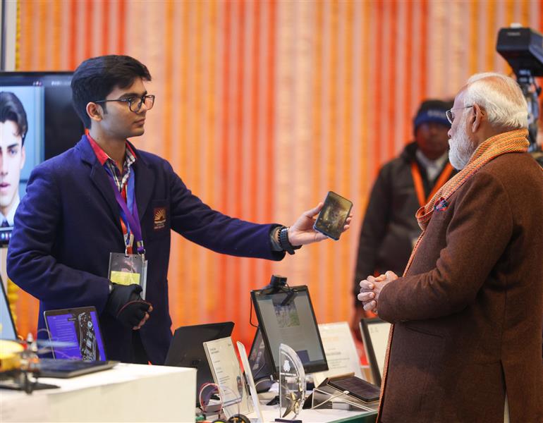 PM visits an exhibition ahead of 7th edition of Pariksha Pe Charcha (PPC) at Bharat Mandapam, in New Delhi on January 29, 2024. 