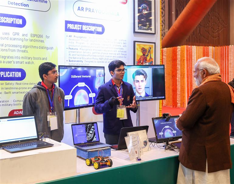 PM visits an exhibition ahead of 7th edition of Pariksha Pe Charcha (PPC) at Bharat Mandapam, in New Delhi on January 29, 2024. 