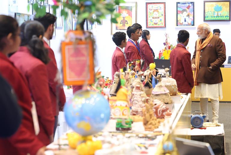 PM visits an exhibition ahead of 7th edition of Pariksha Pe Charcha (PPC) at Bharat Mandapam, in New Delhi on January 29, 2024. 