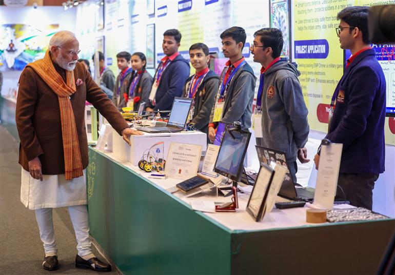 PM visits an exhibition ahead of 7th edition of Pariksha Pe Charcha (PPC) at Bharat Mandapam, in New Delhi on January 29, 2024. 