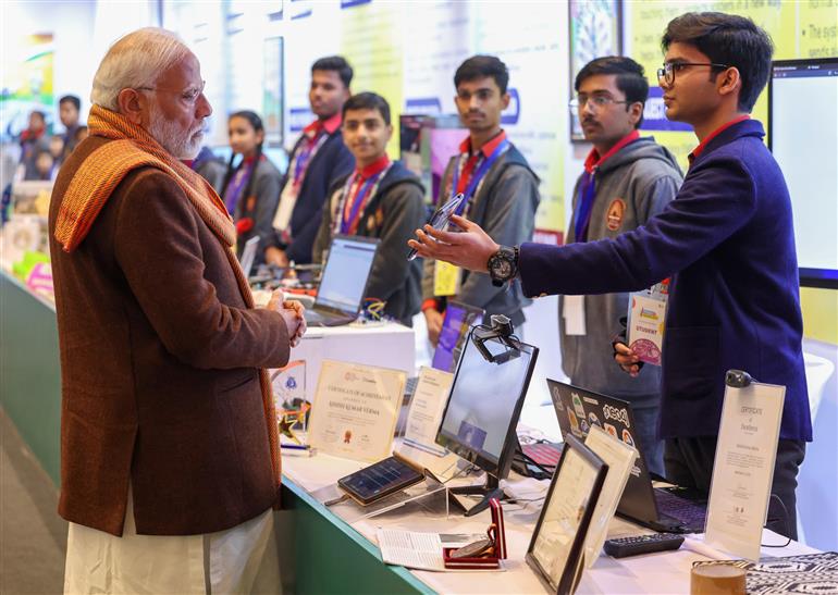 PM visits an exhibition ahead of 7th edition of Pariksha Pe Charcha (PPC) at Bharat Mandapam, in New Delhi on January 29, 2024. 