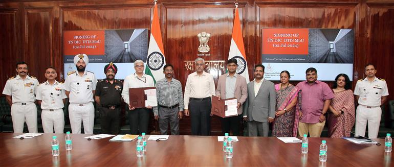 The Defence Secretary, Shri Giridhar Aramane witnessing the signing of MoU between senior officials of Ministry of Defence (MoD) and Tamil Nadu Industrial Development Corporation Limited to set up testing facilities in Unmanned Aerial System (UAS), Electronic Warfare (EW) & Electro Optics (EO) domains in Tamil Nadu Defence Industrial Corridor under the Defence Testing Infrastructure Scheme (DTIS), in New Delhi on July 02, 2024.