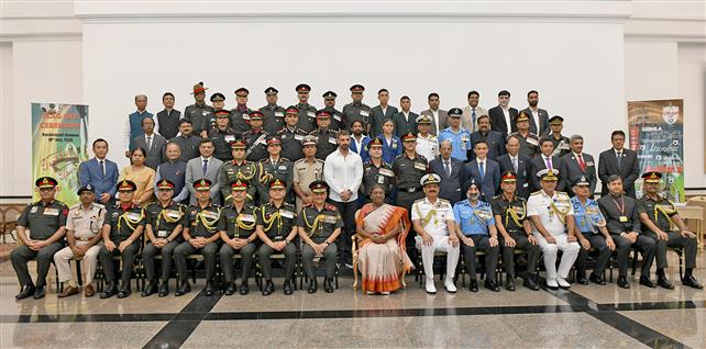 The President of India, Smt Droupadi Murmu in a group photograph during the unveiling and flagging off the Durand Cup, the President’s Cup and Shimla Trophy at Rashtrapati Bhavan Cultural Centre, in New Delhi on July 10, 2024. 