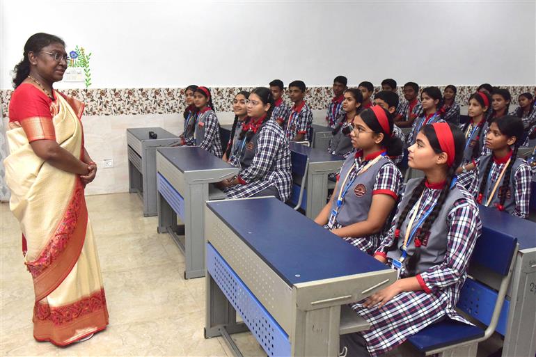 The President of India, Smt Droupadi Murmu interacting with the students of Class IX of Dr. Rajendra Prasad Kendriya Vidyalaya on the completion of 2 years of Presidency at Rashtrapati Bhavan, in New Delhi on July 25, 2024.