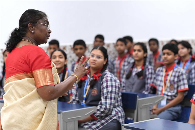 The President of India, Smt Droupadi Murmu interacting with the students of Class IX of Dr. Rajendra Prasad Kendriya Vidyalaya on the completion of 2 years of Presidency at Rashtrapati Bhavan, in New Delhi on July 25, 2024.