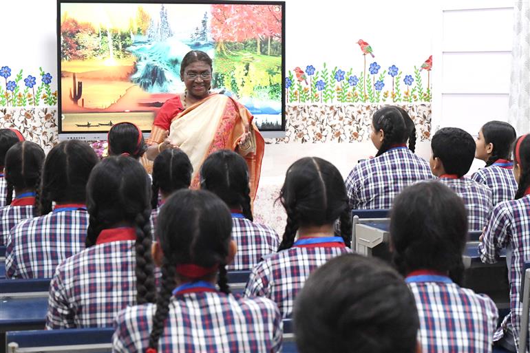 The President of India, Smt Droupadi Murmu interacting with the students of Class IX of Dr. Rajendra Prasad Kendriya Vidyalaya on the completion of 2 years of Presidency at Rashtrapati Bhavan, in New Delhi on July 25, 2024.