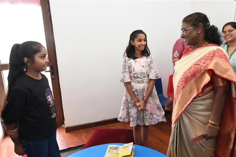 The President of India, Smt Droupadi Murmu interacting with the students of Class IX of Dr. Rajendra Prasad Kendriya Vidyalaya on the completion of 2 years of Presidency at Rashtrapati Bhavan, in New Delhi on July 25, 2024.