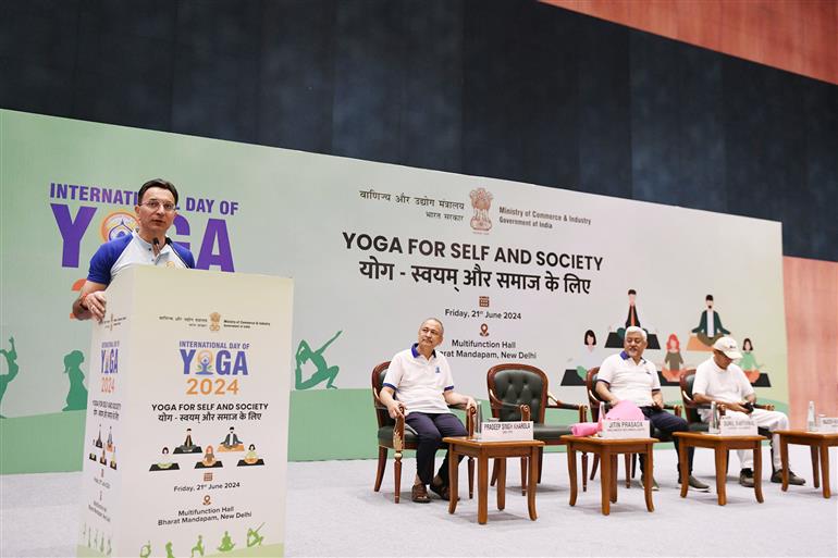 The Minister of State for Ministry of Commerce and Industry & Electronics and Information Technology, Shri Jatin Prasada addressing at the 10th International Day of Yoga celebrations at Bharat Mandapam (Pragati Maidan), in New Delhi on June 21, 2024.