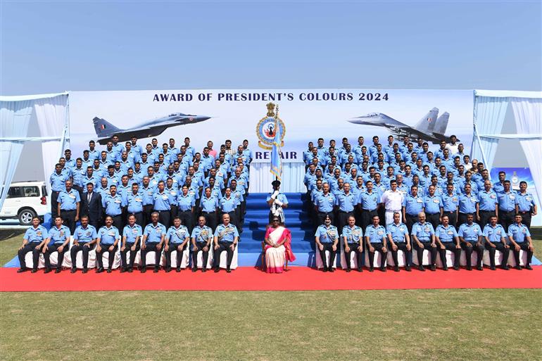 The President of India, Smt Droupadi Murmu in a group photograph during the Award of President’s Standard and President’s Colours at Air Force Station (Hindon), in Uttar Pradesh on March 08, 2024.