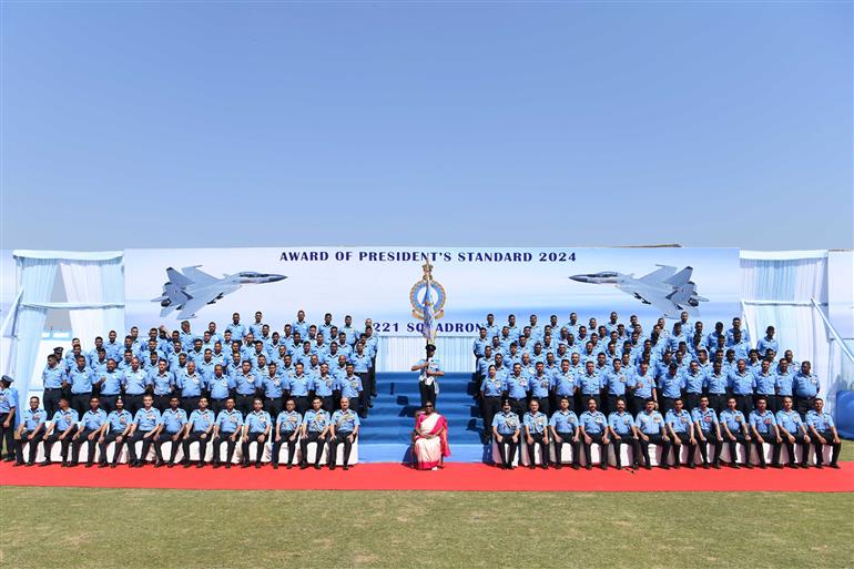 The President of India, Smt Droupadi Murmu in a group photograph during the Award of President’s Standard and President’s Colours at Air Force Station (Hindon), in Uttar Pradesh on March 08, 2024.