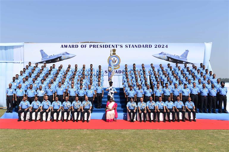 The President of India, Smt Droupadi Murmu in a group photograph during the Award of President’s Standard and President’s Colours at Air Force Station (Hindon), in Uttar Pradesh on March 08, 2024.