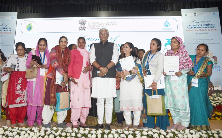 The Union Minister for Jal Shakti, Shri Gajendra Singh Shekhawat in a group photograph during the launch of Jal Shakti Abhiyan: Catch the Rain - 2024 campaign on the theme “Nari Shakti se Jal Shakti” at NDMC Convention Centre, in New Delhi on March 09, 2024.