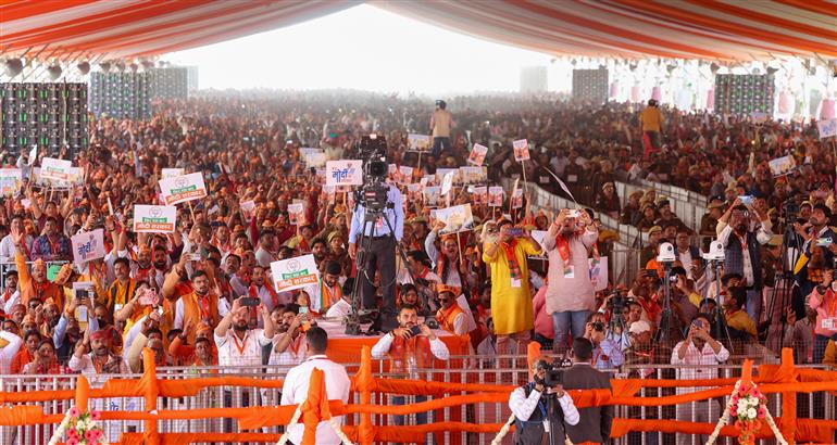 PM receives warm welcome by people during foundation stone laying of various development projects at Azamgarh, in Uttar Pradesh on March 10, 2024.