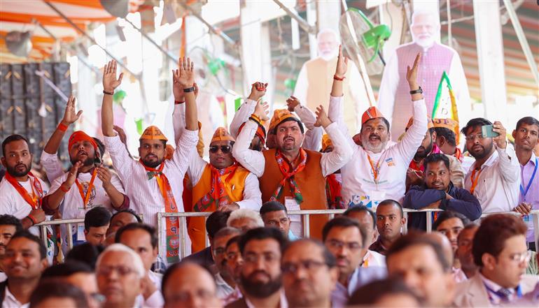 PM receives warm welcome by people during foundation stone laying of various development projects at Azamgarh, in Uttar Pradesh on March 10, 2024.