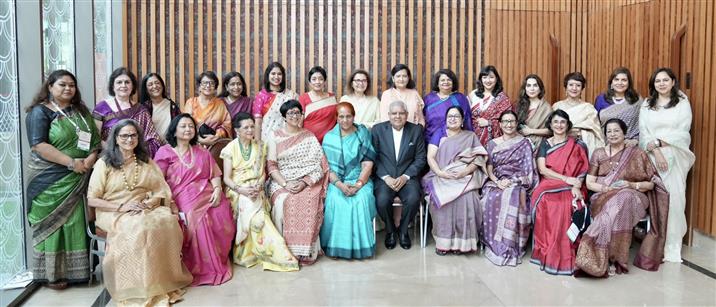 The Vice President of India and Chairman, Rajya Sabha, Shri Jagdeep Dhankhar in a group photograph with the members of FICCI Ladies Organisation (FLO) at Bharat Mandapam, in New Delhi on March 27, 2024.