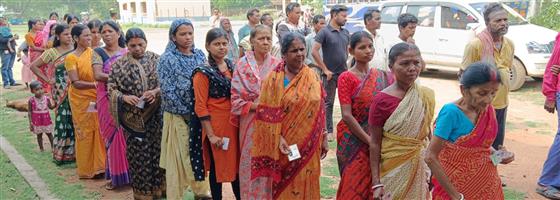 Voters standing in the queue to cast their votes, at a polling booth, during the 4th Phase of General Elections-2024 at Birbhum, in West Bengal on May 13, 2024.