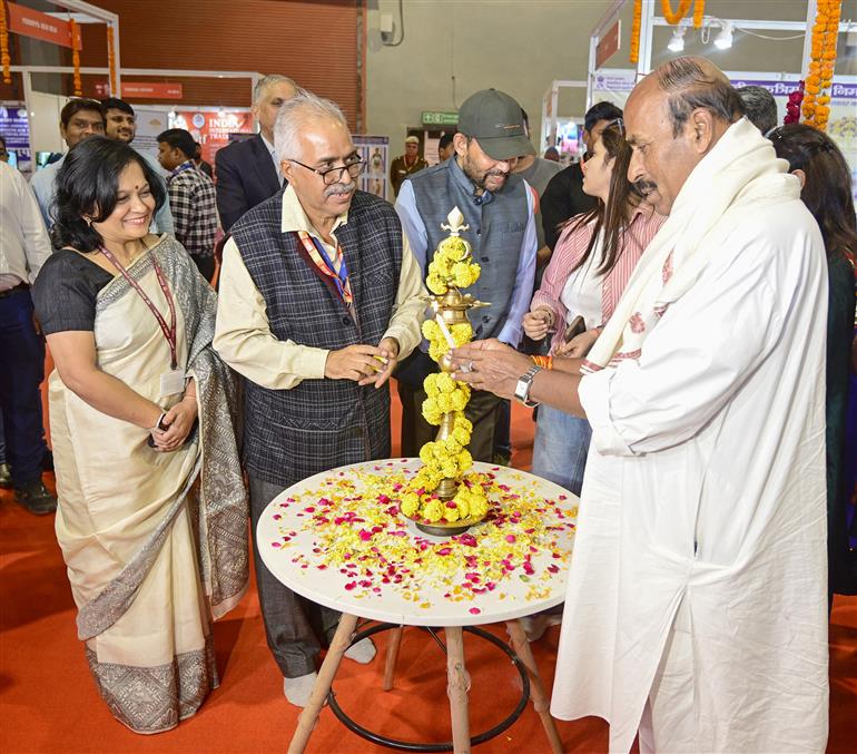 The Union Minister of Social Justice and Empowerment, Dr. Virendra Kumar lighting the lamp at the inauguration of the Special Exhibition (Hall No.1) and Ministry Pavilion, Hall No. 5(G) at the India International Trade Fair (IITF) 2024, in Bharat Mandapam, New Delhi on November 15, 2024.