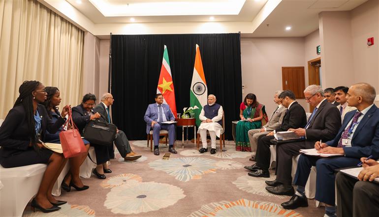 PM in a bilateral meeting with the President of Suriname, Mr. Chandrikapersad Santokhi at Georgetown, in Guyana on November 20, 2024.