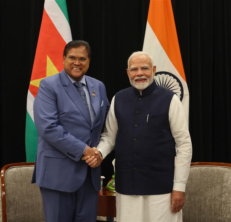 PM in a bilateral meeting with the President of Suriname, Mr. Chandrikapersad Santokhi at Georgetown, in Guyana on November 20, 2024.