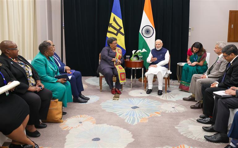 PM in a bilateral meeting with the Prime Minister of Barbados, Ms. Mia Amor Mottley at Georgetown, in Guyana on November 20, 2024.