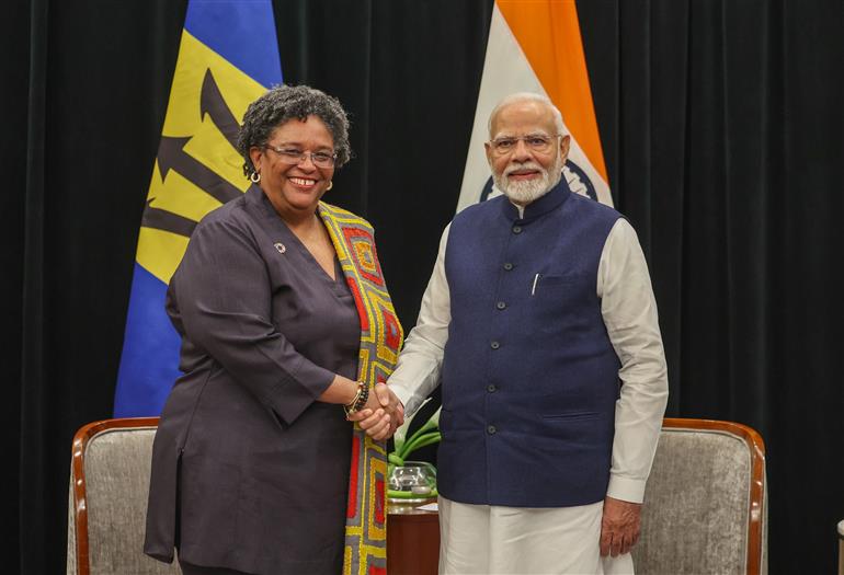 PM in a bilateral meeting with the Prime Minister of Barbados, Ms. Mia Amor Mottley at Georgetown, in Guyana on November 20, 2024.