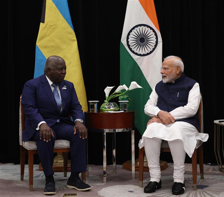 PM in a bilateral meeting with the Prime Minister of Bahamas, Mr. Philip Davis at Georgetown, in Guyana on November 20, 2024.