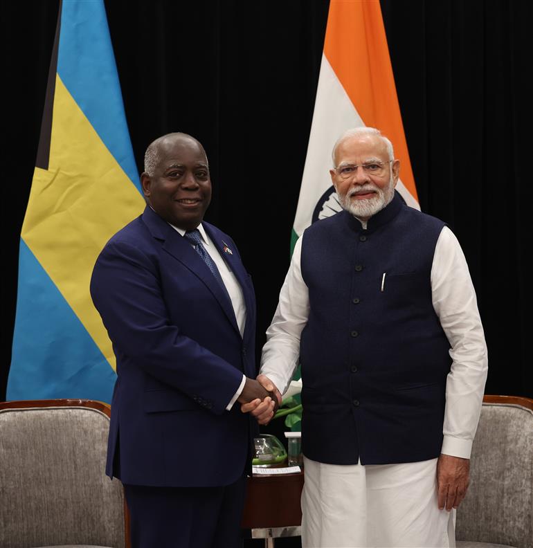 PM in a bilateral meeting with the Prime Minister of Bahamas, Mr. Philip Davis at Georgetown, in Guyana on November 20, 2024.