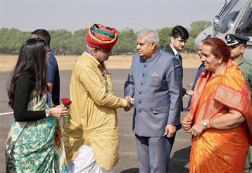 The Vice President of India, Shri Jagdeep Dhankhar and Dr. Sudesh Dhankhar being welcomed by Shri Jhabar Singh Kharra, Minister, Government of Rajasthan and other dignitaries on their arrival, in Jhunjhunu, Rajasthan on November 20, 2024.