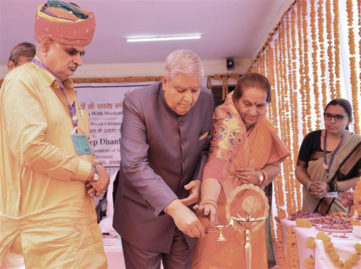 The Vice President of India, Shri Jagdeep Dhankhar lighting the lamp at World Children’s Day celebrations at PM SHRI Jawahar Navodaya Vidyalaya (JNV) at Kajra, in Jhunjhunu, Rajasthan on November 20, 2024.