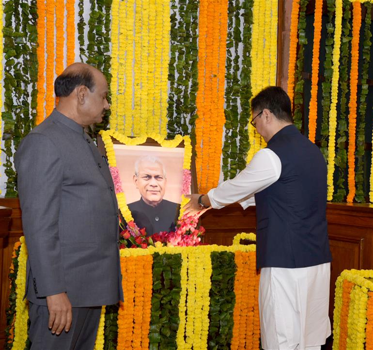 The Union Minister of Parliamentary Affairs and Minority Affairs, Shri Kiren Rijiju paying floral tributes to former Lok Sabha Speaker, Shri Rabi Ray on the occasion of his birth anniversary at Central Hall of Samvidhan Sadan, in New Delhi on November 26, 2024.