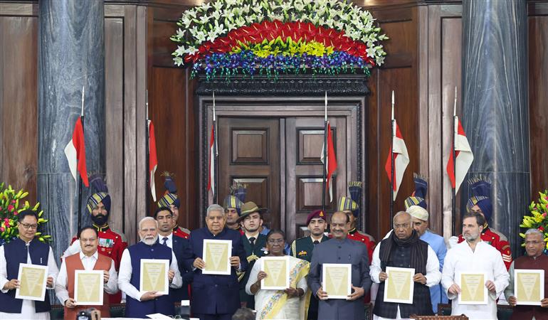The President of India, Smt. Droupadi Murmu, the Vice President of India, Shri Jagdeep Dhankhar and PM attend Constitution Day 2024 celebrations at Central Hall, in Parliament House, New Delhi on November 26, 2024.