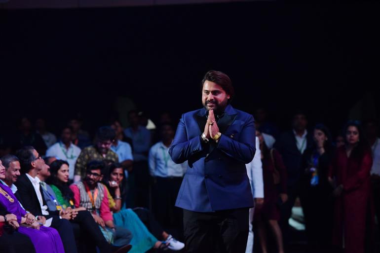 The Secretary, Ministry of Information & Broadcasting, Shri Sanjay Jaju announces Shri Navjyot Bandiwadekar, director of Gharat Ganpati as the best debut director of Indian Feature Film at 55th IFFI, in Goa on November 28, 2024.