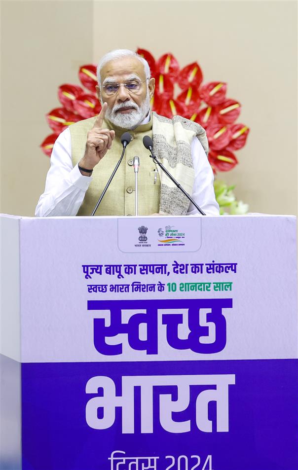 PM addressing at the 10th anniversary of the Swachh Bharat Mission at Vigyan Bhavan, in New Delhi on October 02, 2024.