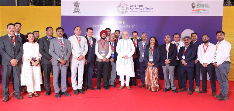 The Union Minister for Home Affairs and Cooperation, Shri Amit Shah in a group photograph during the inauguration of the Passenger Terminal Building and Maitri Dwar, in Petrapole, West Bengal on October 27, 2024.