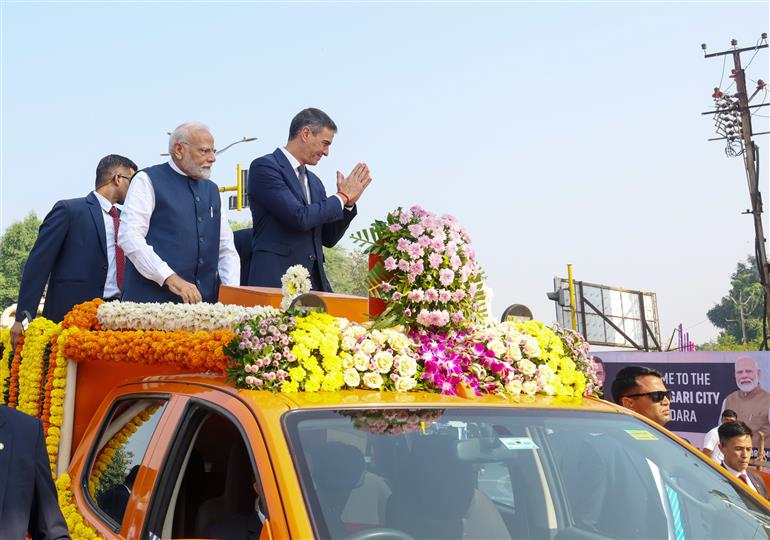 PM along with the Prime Minister of Spain, Mr. Pedro Sanchez receive warm welcome by people during their roadshow at Vadodara, in Gujarat on October 28, 2024.