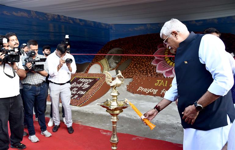 The Union Minister of Culture and Tourism, Shri Gajendra Singh Shekhawat lighting the lamp at the inauguration of exhibition at the National Gallery of Modern Art, in New Delhi on September 16, 2024.