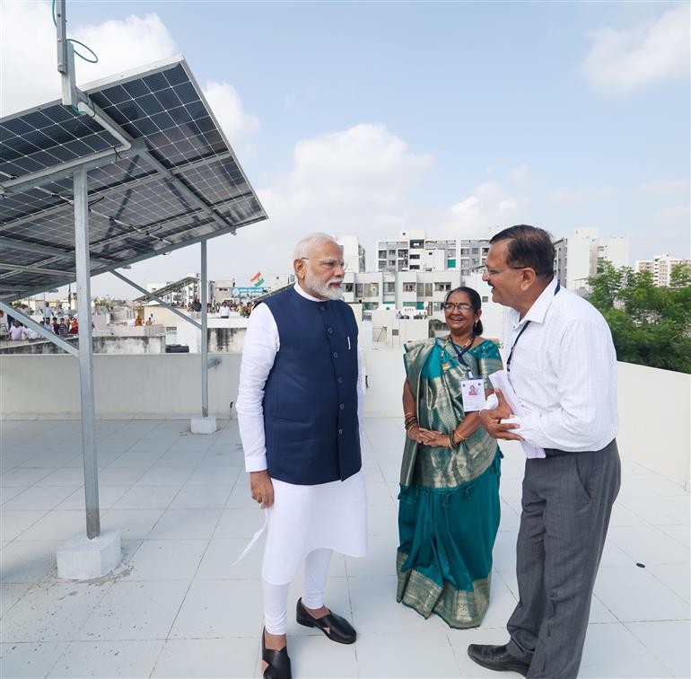 PM interacting with beneficiaries of PM Surya Ghar Muft Bijli Yojana at Gandhinagar, in Gujarat on September 16, 2024.